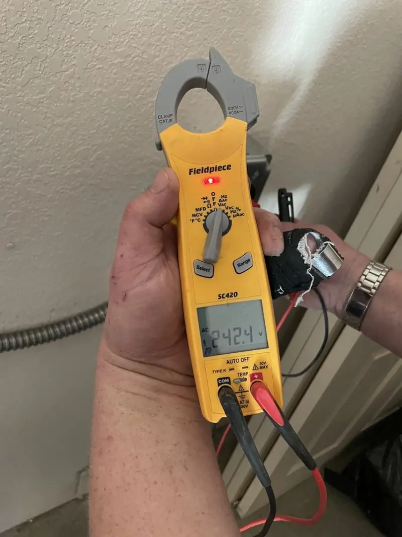 Voltage testing with clamp meter during Electrical Installation Services in Cranston